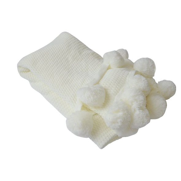White pompon knitting blanket